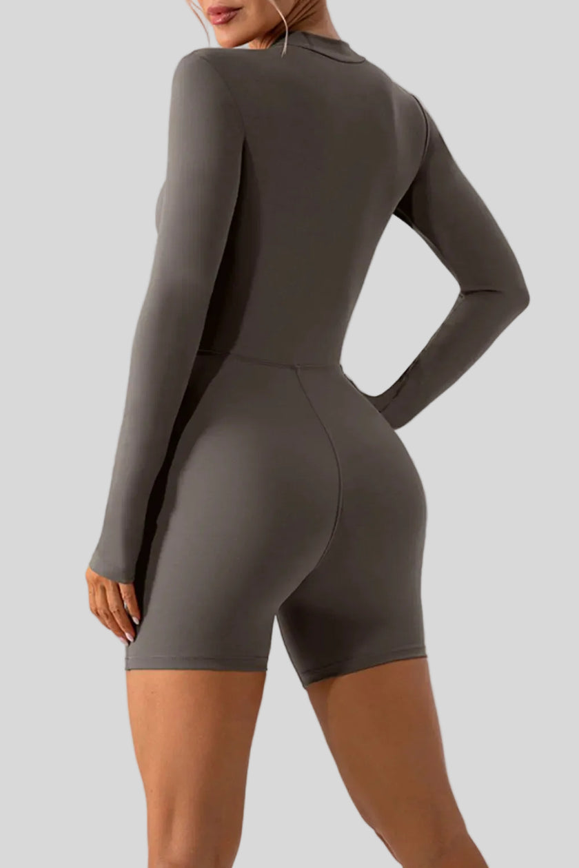 Back view of Athlesi PowerSculpt long sleeve romper in dark gray