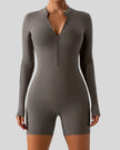 Athlesi PowerSculpt long sleeve romper in dark gray, front view