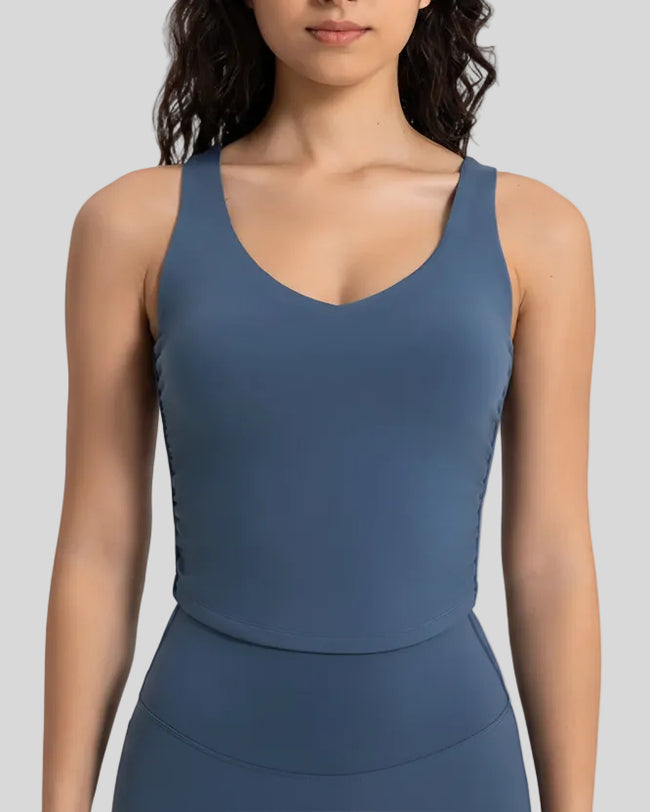 Athlesi PulseCore cropped active tank in peacock blue, front view
