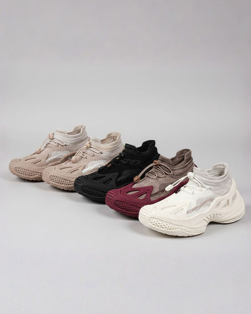 Mesh sneakers studio side view displayed in multiple colors showing sculpted sole design