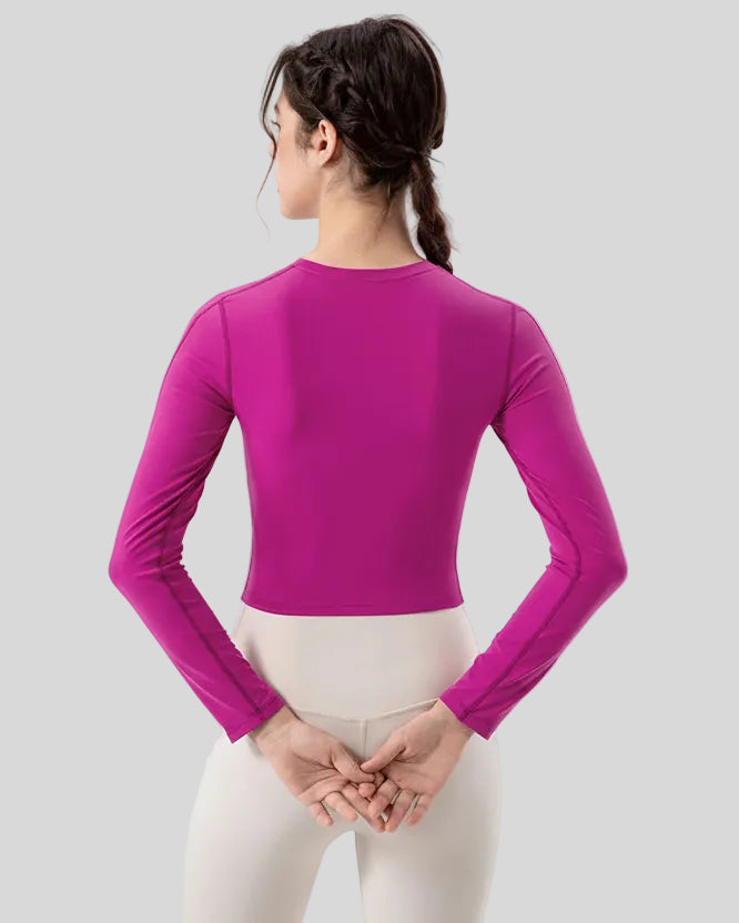 Back view of red violet PulseMesh Studio Top with long sleeves