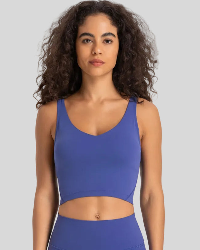 PureForm deep V sports bra in indigo front view minimal cropped design
