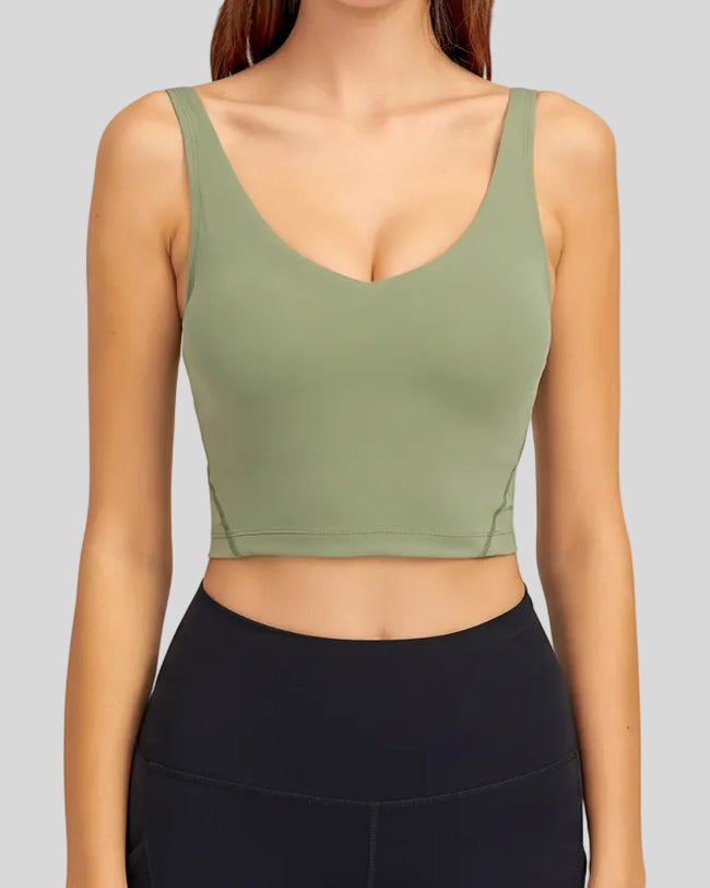 PureForm deep V sports bra in sage front view minimal cropped design
