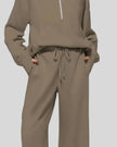 Close-up of Athlesi PureMotion Half-Zip Lounge Set showing half-zip neckline and fabric texture in brown