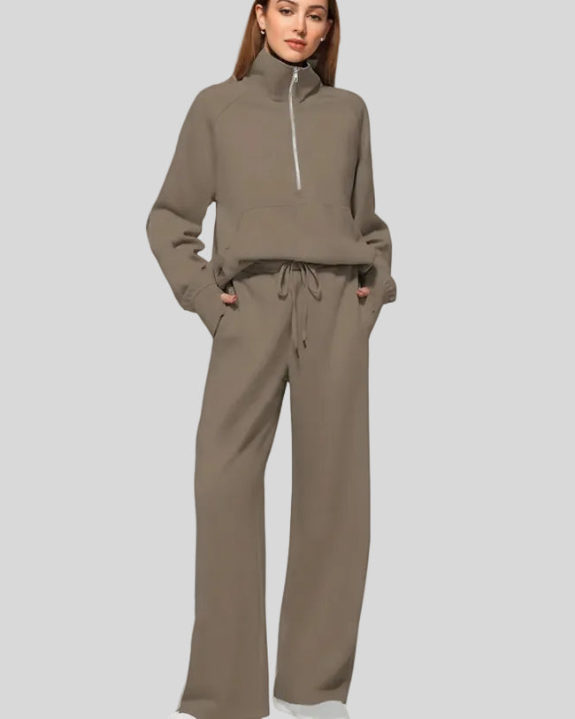 Woman wearing Athlesi PureMotion Half-Zip Lounge Set in brown, front full body view