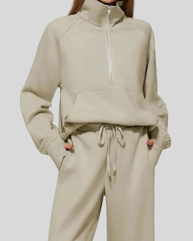 Close-up of Athlesi PureMotion Half-Zip Lounge Set showing half-zip neckline and fabric texture in khaki