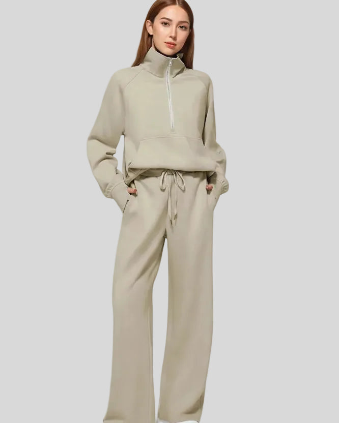 Woman wearing Athlesi PureMotion Half-Zip Lounge Set in khaki, front full body view