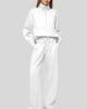 Woman wearing Athlesi PureMotion Half-Zip Lounge Set in white, front full body view