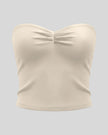 Athlesi QuietForm Ruched Tube Top in Pale Khaki, front view with strapless neckline and center ruching