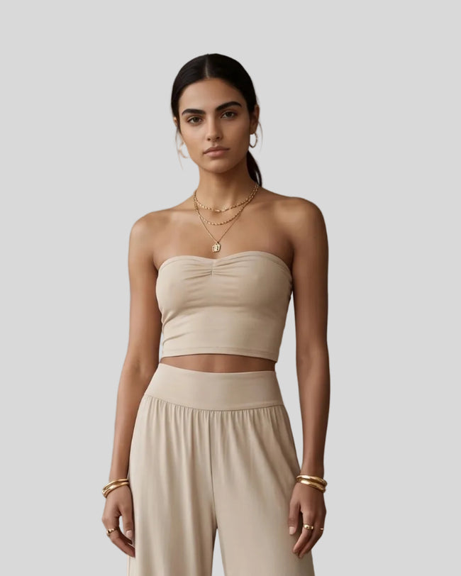 Model wearing the Athlesi QuietForm Ruched Tube Top in Pale Khaki, mid-body front view