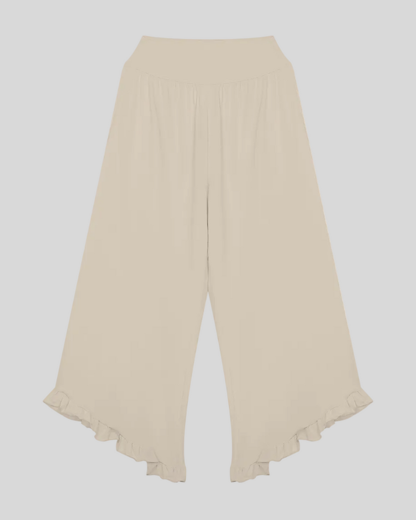 Athlesi QuietForm Wide Leg Pants in Pale Khaki, front view with high-rise waistband, flowing wide legs, and ruffle hem