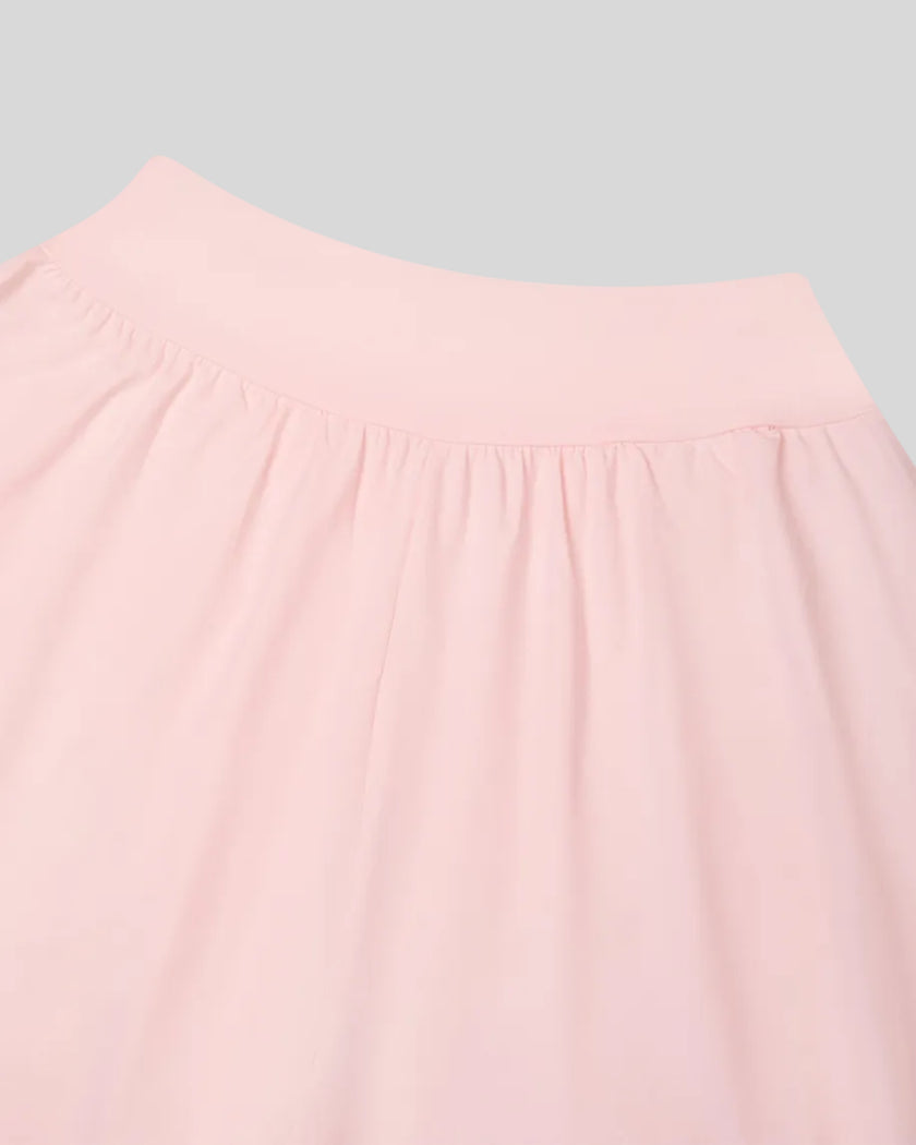 Back close-up of Athlesi QuietForm Wide Leg Pants in Pink showing the clean waistband and gathered wide-leg construction