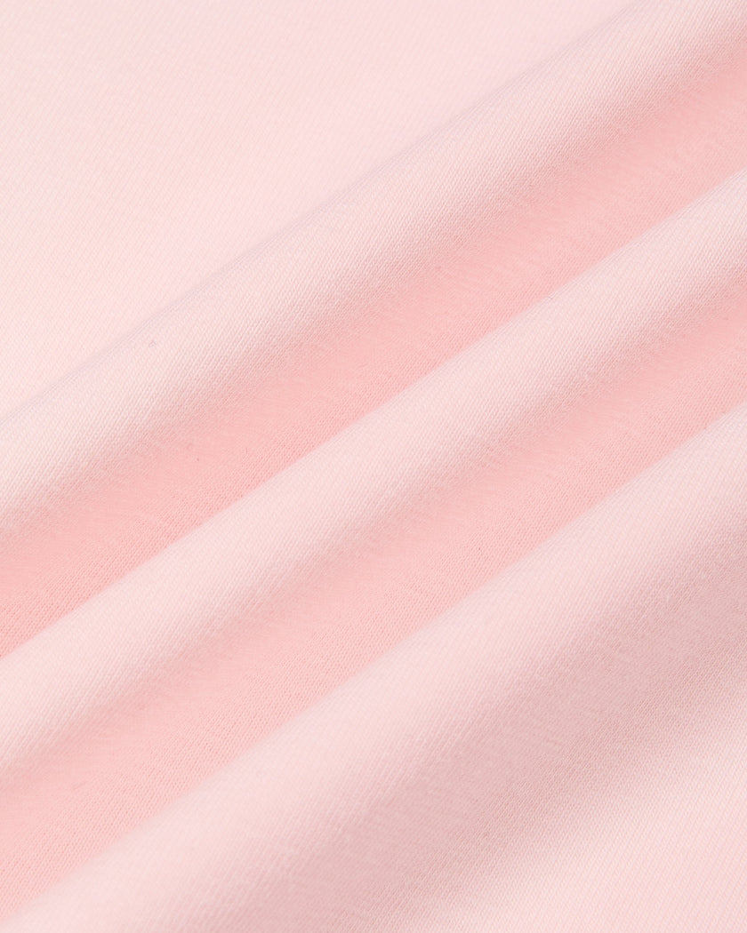 Close-up of the soft stretch cotton fabric of the Athlesi QuietForm Wide Leg Pants in Pink