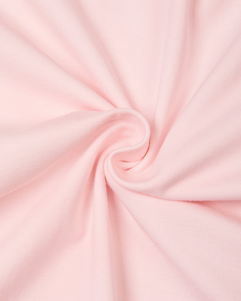 Detailed view of the lightweight cotton-stretch fabric and drape of the Athlesi QuietForm Wide Leg Pants in Pink