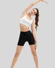 Ribbed wide-waist active shorts in black, angled front view