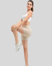 Ribbed wide-waist active shorts in tan, side view
