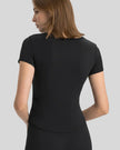 Ribnotch short sleeve active top in black, back view