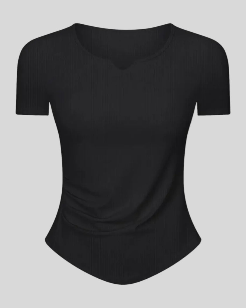 Ribnotch short sleeve active top in black, angled front view