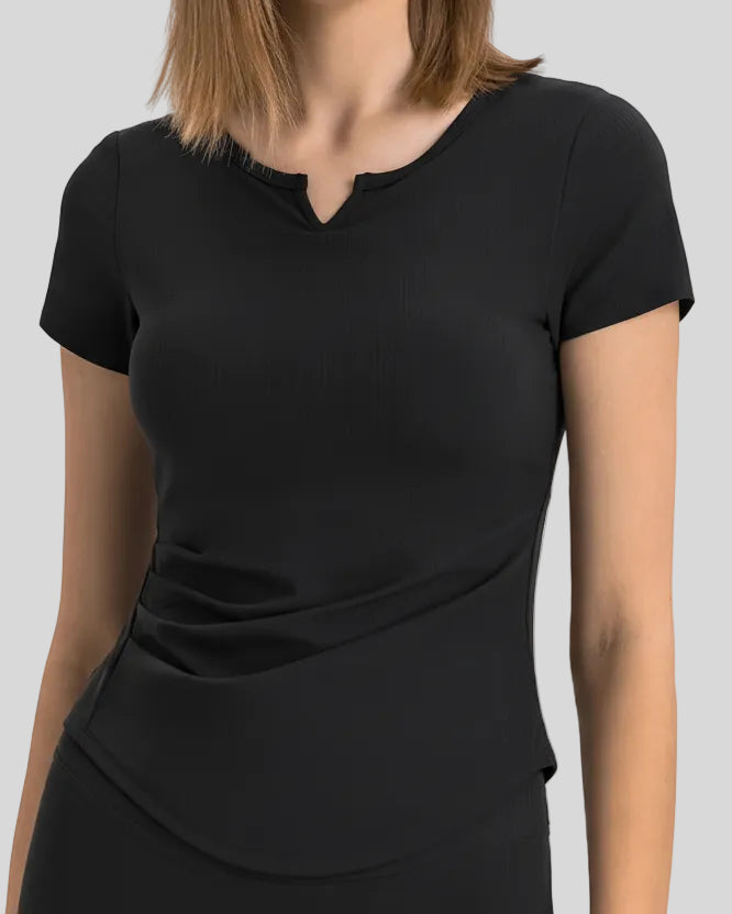 Ribnotch short sleeve active top in black, front view