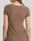 Ribnotch short sleeve active top in brown, back view