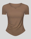 Ribnotch short sleeve active top in brown, angled front view