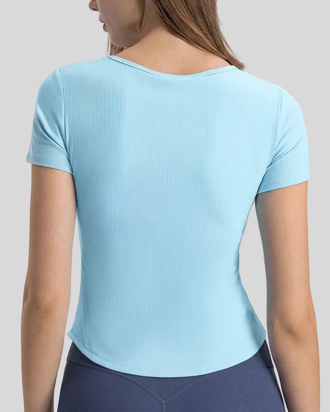 Ribnotch short sleeve active top in pastel blue, back view