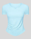 Ribnotch short sleeve active top in pastel blue, angled front view