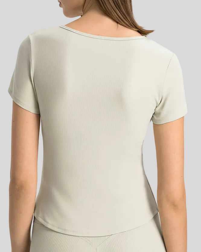 Ribnotch short sleeve active top in white, back view