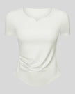 Ribnotch short sleeve active top in white, angled front view