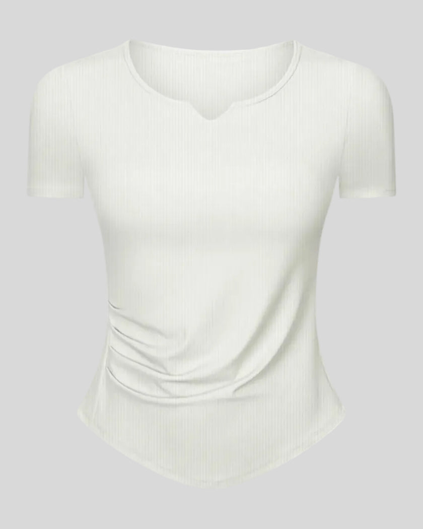 Ribnotch short sleeve active top in white, angled front view