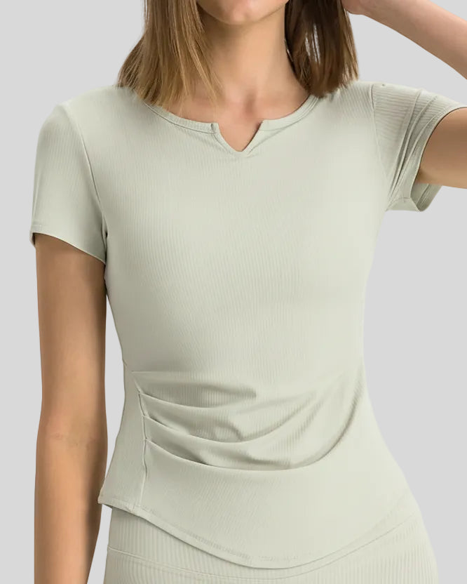Ribnotch short sleeve active top in white, front view