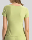 Ribnotch short sleeve active top in yellow green, back view