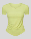 Ribnotch short sleeve active top in yellow green, angled front view