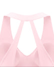 Closeup of open-back strap construction on Sculpt Halter Sports Bra in pink