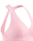 Closeup of side fit and construction on Sculpt Halter Sports Bra in pink