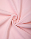Detailed view of lightweight stretch fabric on Sculpt Yoga Pants in pink