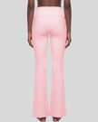 Lower body back view of woman wearing Sculpt Yoga Pants in pink