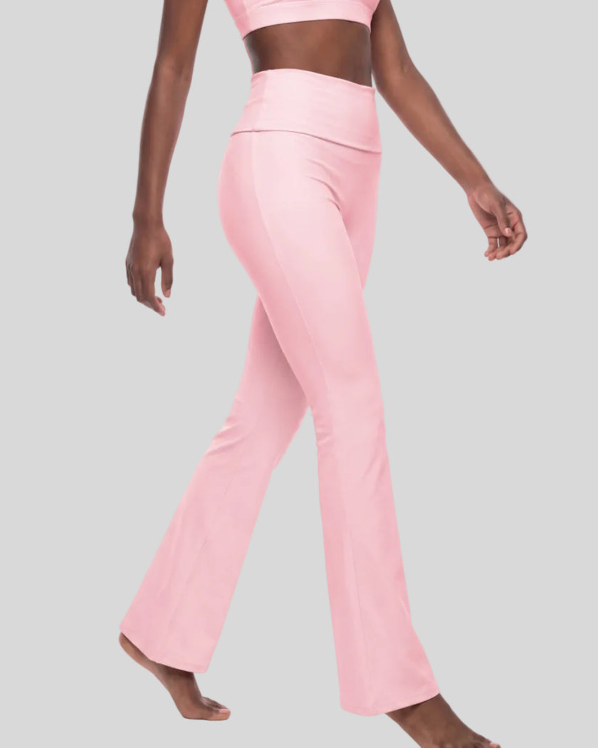 Angled side view of woman wearing Sculpt Yoga Pants in pink