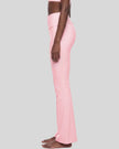 Lower body side view showing the flared silhouette of Sculpt Yoga Pants in pink