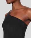Closeup of off-shoulder side detail on Athlesi SculptLine active romper in black