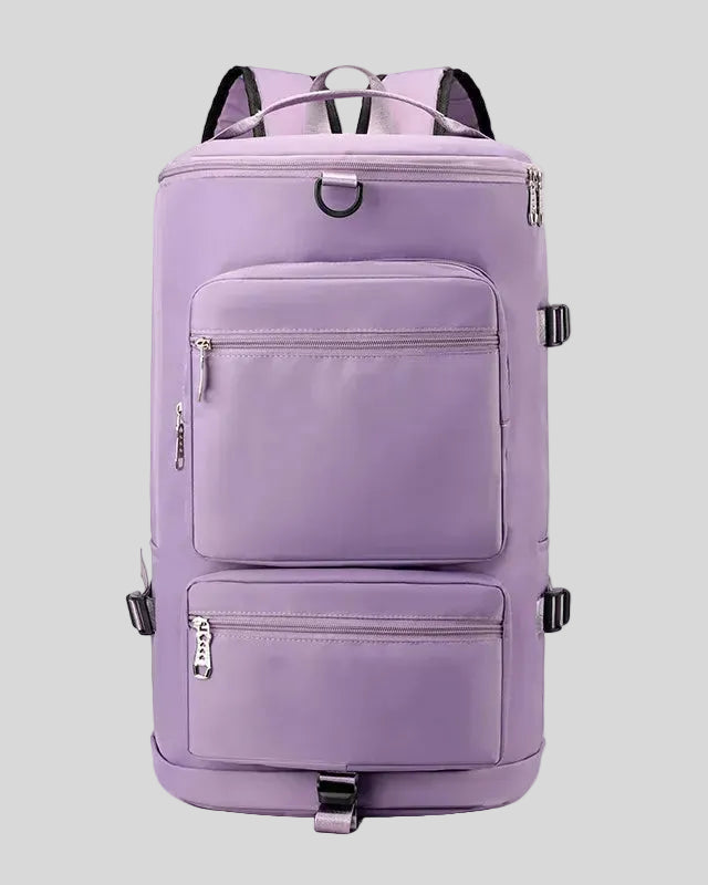 ShiftForm Carry Pack in lilac shown in vertical position with structured multi-pocket design