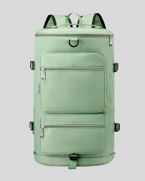 ShiftForm Carry Pack in neon green shown in vertical position with structured multi-pocket design