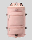 ShiftForm Carry Pack in watermelon pink shown in vertical position with structured multi-pocket design