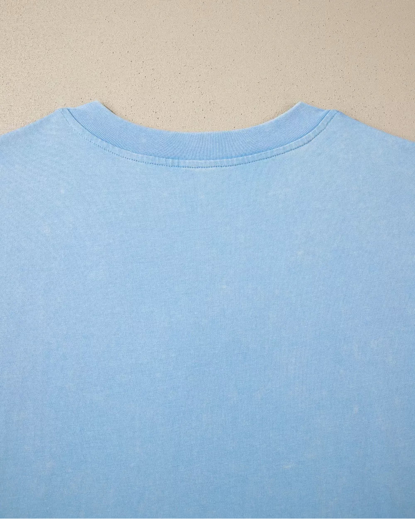 Back collar closeup of the SkyEase Lounge Set in pastel blue showing soft ribbed trim detail