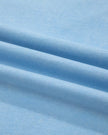 Fabric closeup of the SkyEase Lounge Set in pastel blue showing soft breathable cotton texture