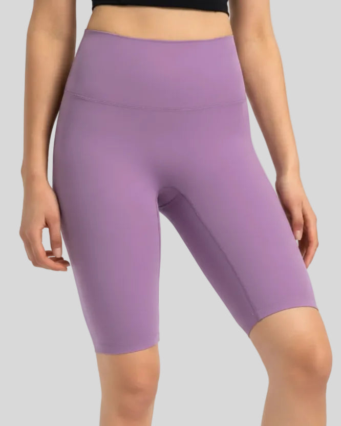 Angled front view showing smooth fit and biker length in lavender
