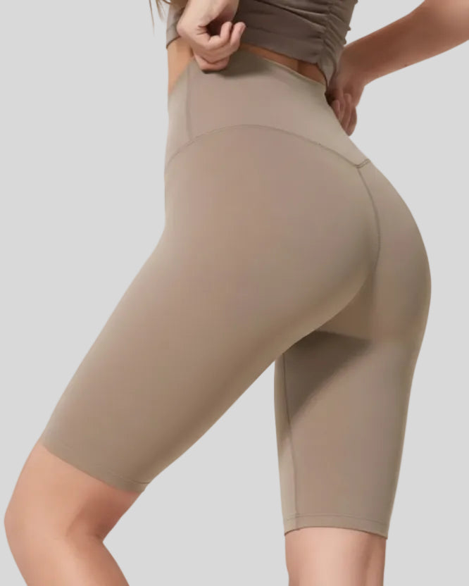 Left side view of mocha biker short length and sculpted fit