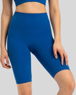 Front view of Athlesi SmoothForm Seamless Biker Short in royal blue with wide waistband