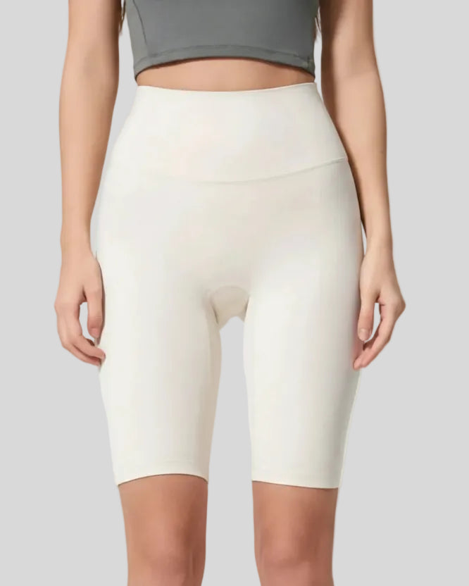 Front view of Athlesi SmoothForm Seamless Biker Short in white with wide waistband