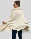 SoftMotion open-front poncho in ivory showing flowy silhouette and fringe trim, back view
